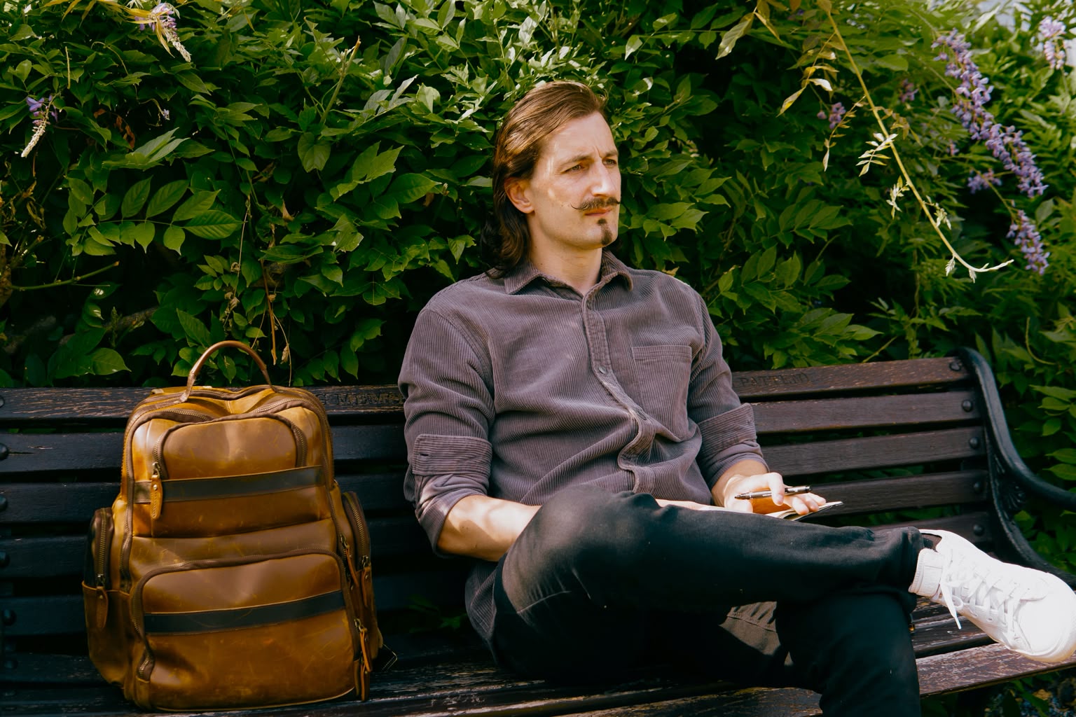 Alex Gunn sitting on a bench